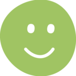 Vihreä hymyilevä naama, jossa on yksinkertaiset silmät ja suu.